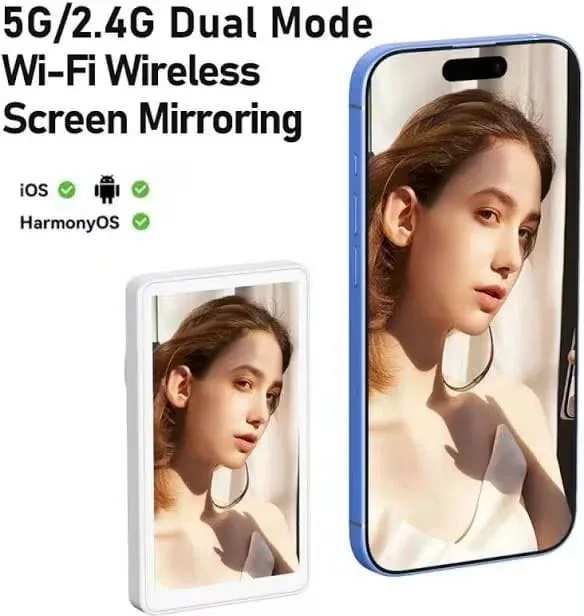 Selfie monitor alongside a smartphone showing a matching image